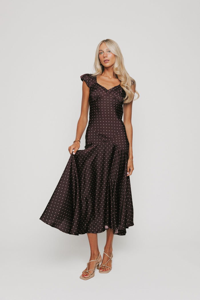 brown satin dress with pink polka dots and cap sleeves full