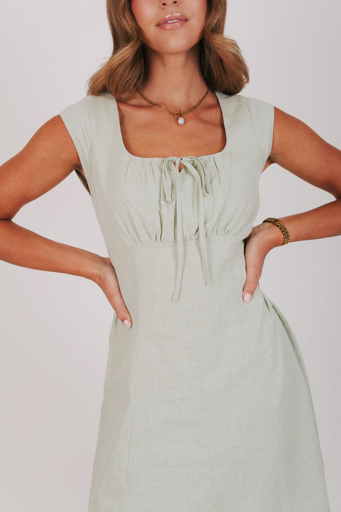 gathered bust with keyhole midi dress green front