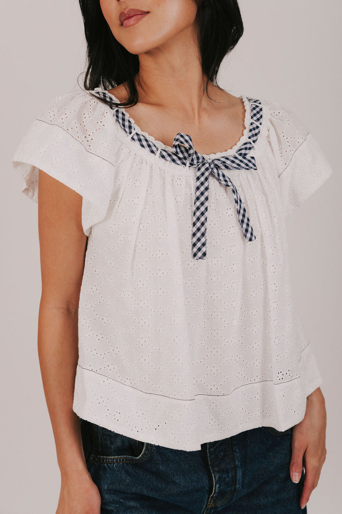 White eyelet blouse exclusive with gingham contrast