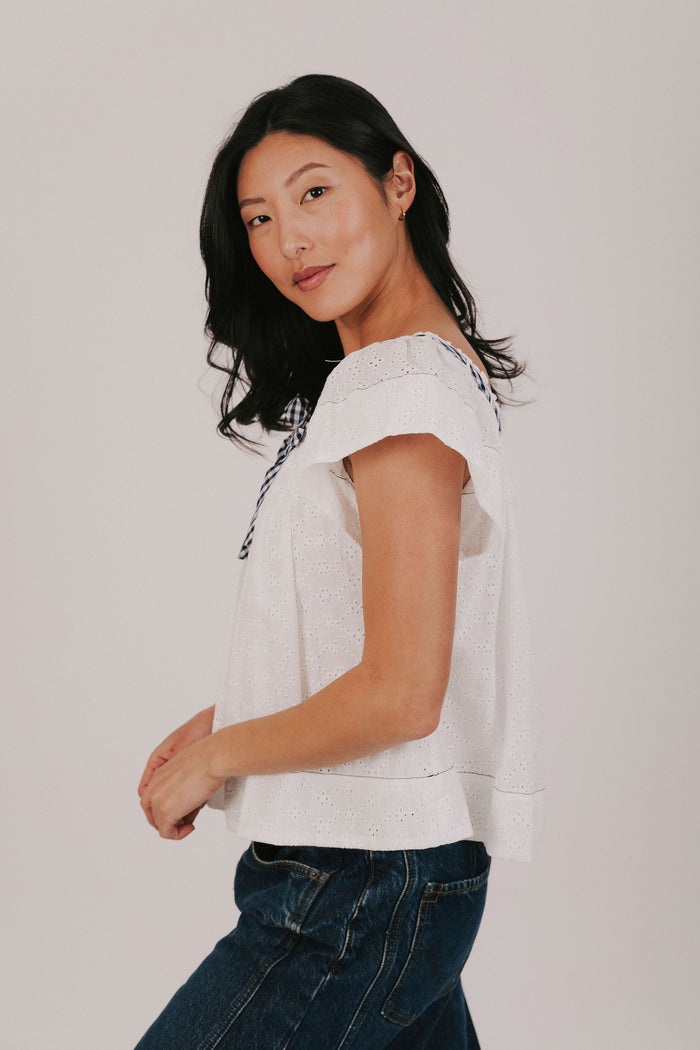 White eyelet blouse exclusive with gingham contrast
