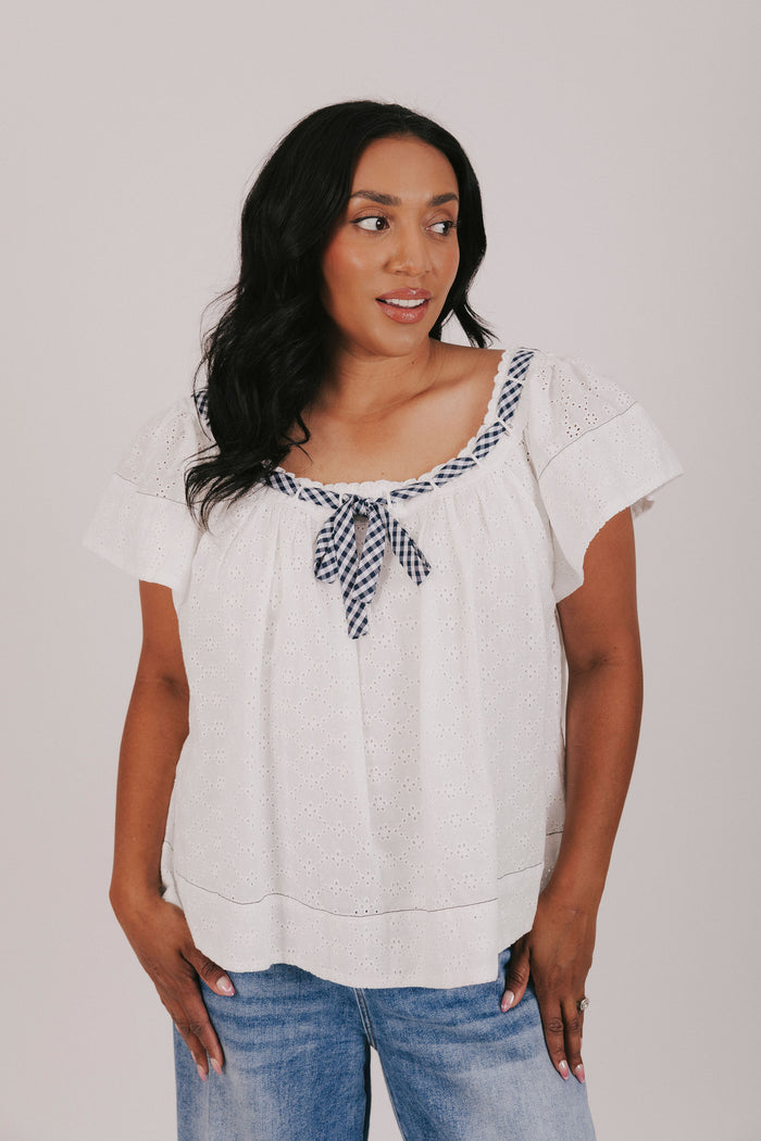 White eyelet blouse exclusive with gingham contrast
