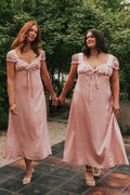 blush satin white trim puff sleeve ruched dress lifestyle