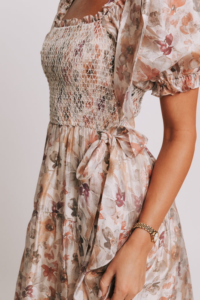 multi floral tiered maxi dress with puff sleeves and smocked bodice close side