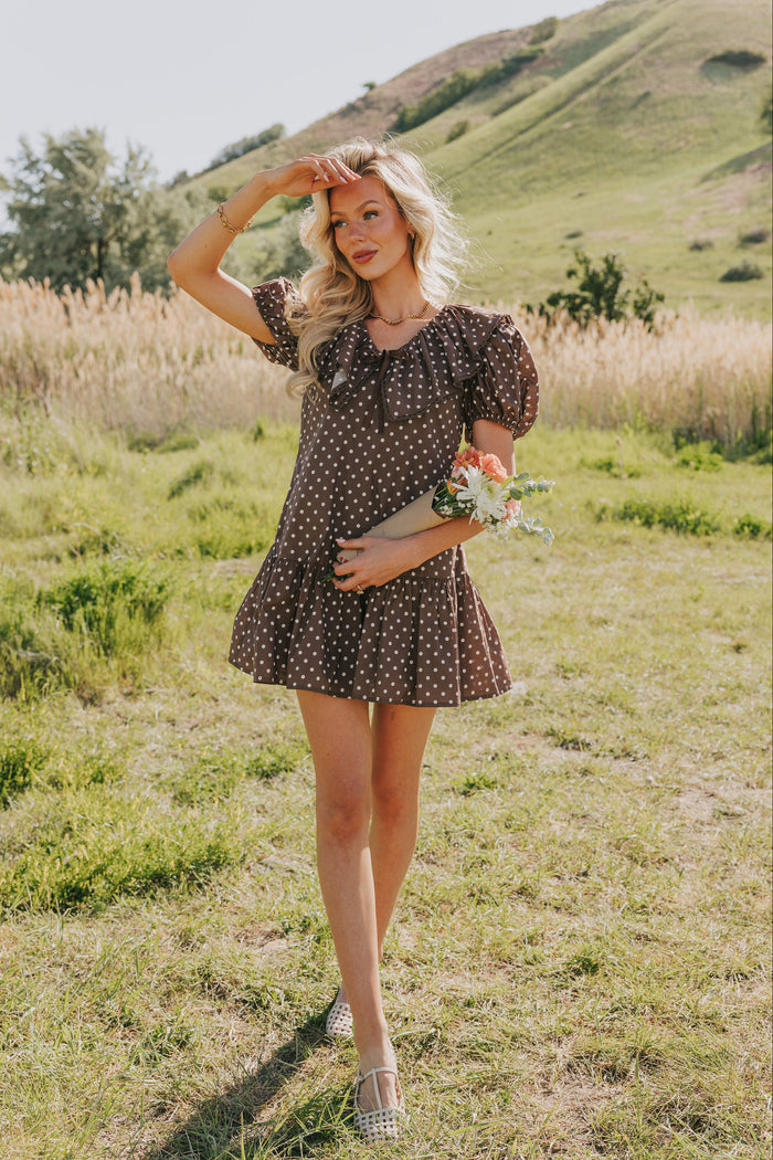 brown polka dot mini dress with puff sleeves and collar