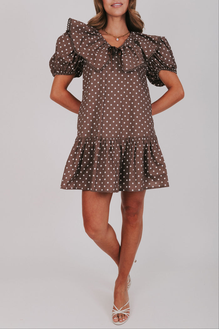 brown polka dot mini dress with puff sleeves and collar