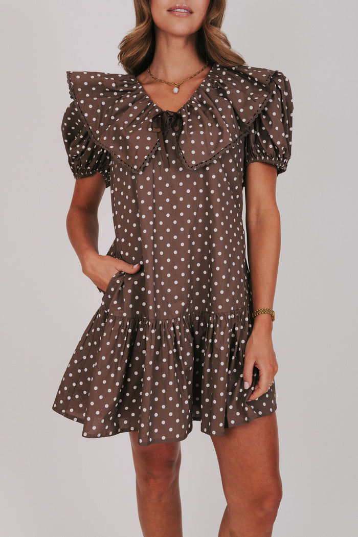 brown polka dot mini dress with puff sleeves and collar