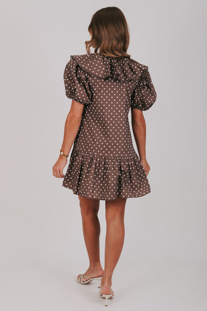 brown polka dot mini dress with puff sleeves and collar