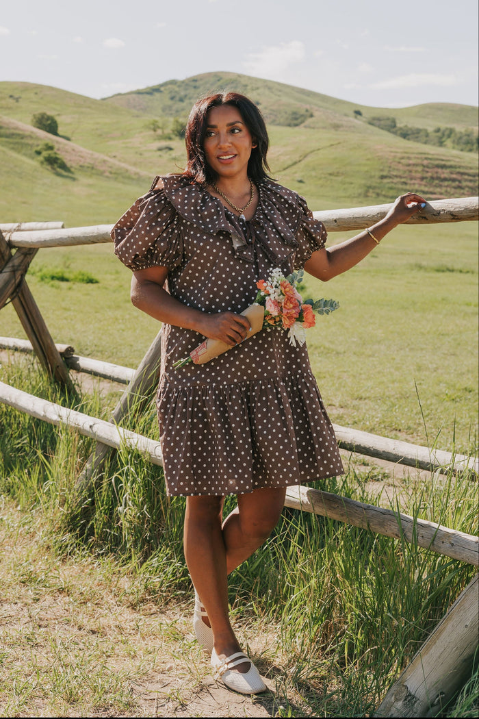 brown polka dot mini dress with puff sleeves and collar