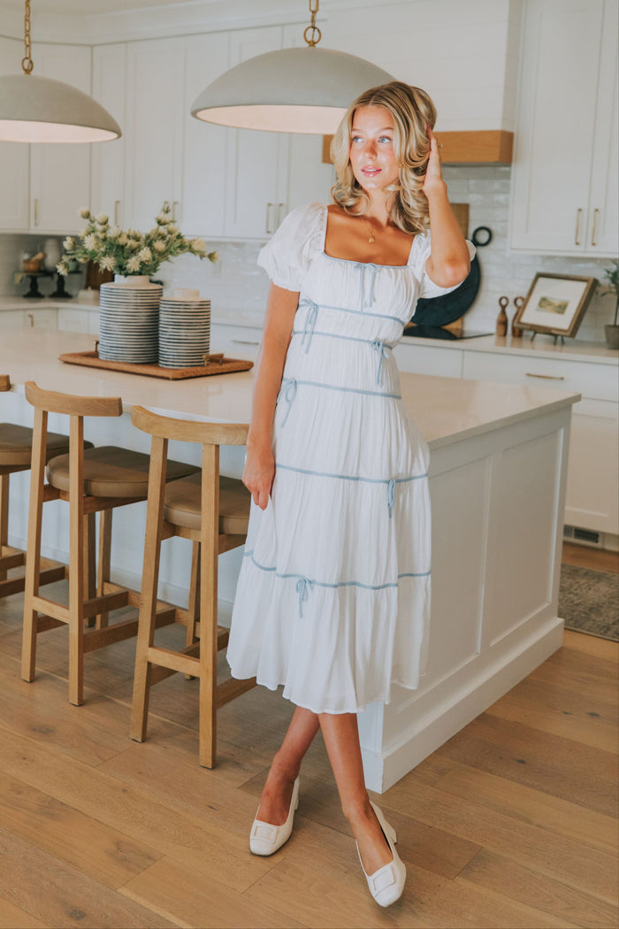 Maxi midi dress with piped details puff sleeves square neckline bow details