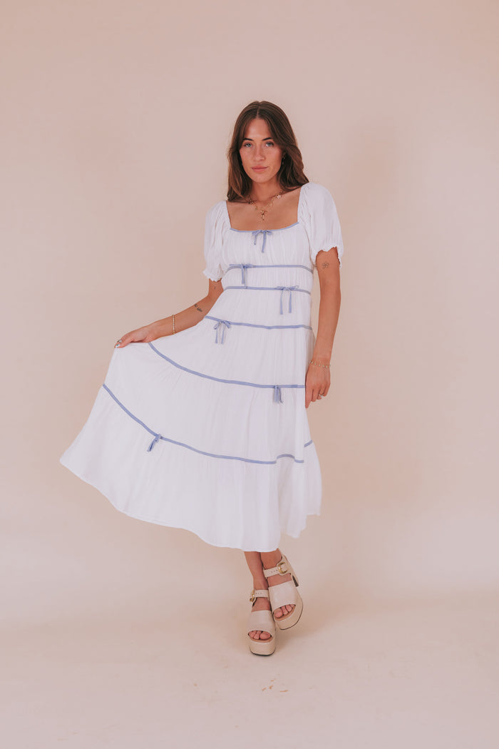 Maxi midi dress with piped details puff sleeves square neckline bow details