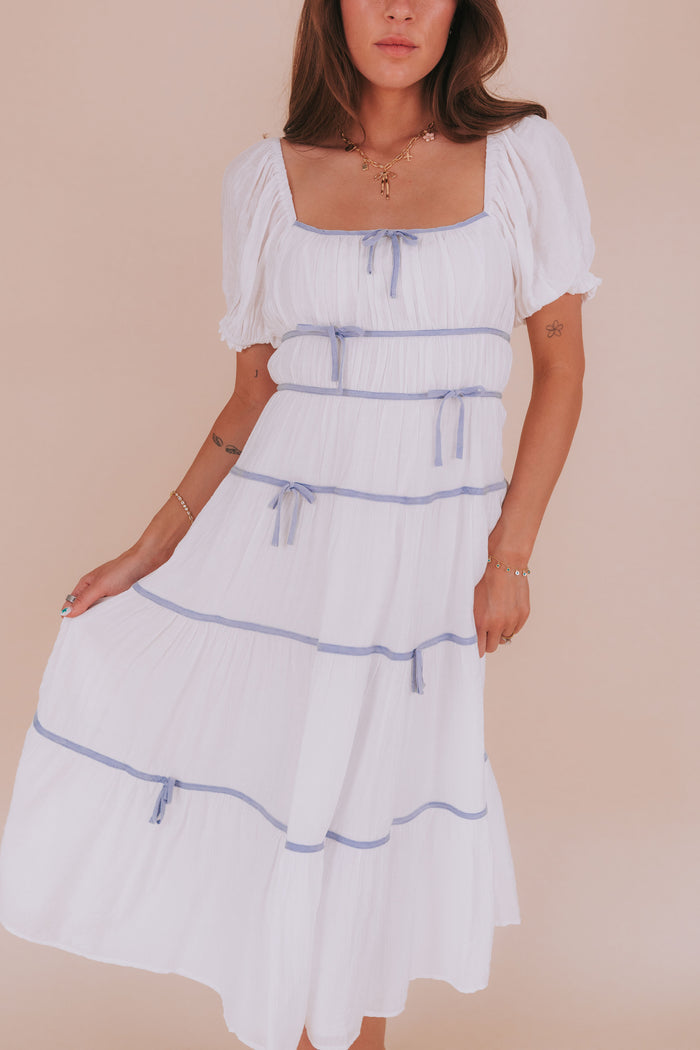 Maxi midi dress with piped details puff sleeves square neckline bow details