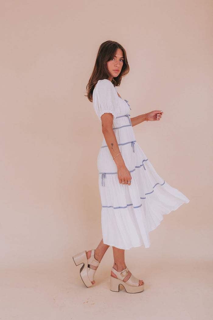 Maxi midi dress with piped details puff sleeves square neckline bow details