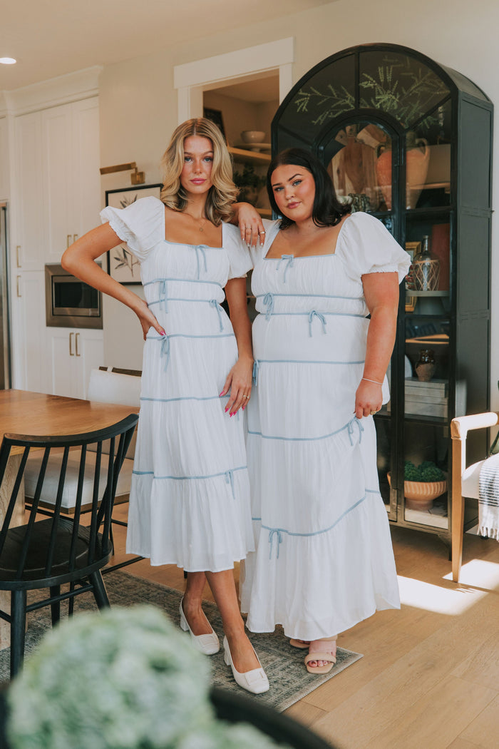Maxi midi dress with piped details puff sleeves square neckline bow details