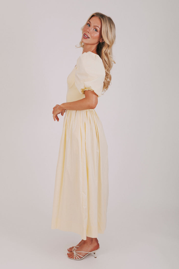exclusive butter yellow puff sleeve maxi dress side