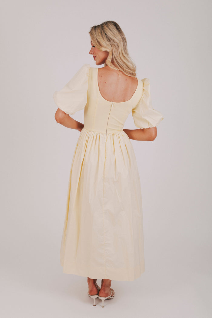 exclusive butter yellow puff sleeve maxi dress back