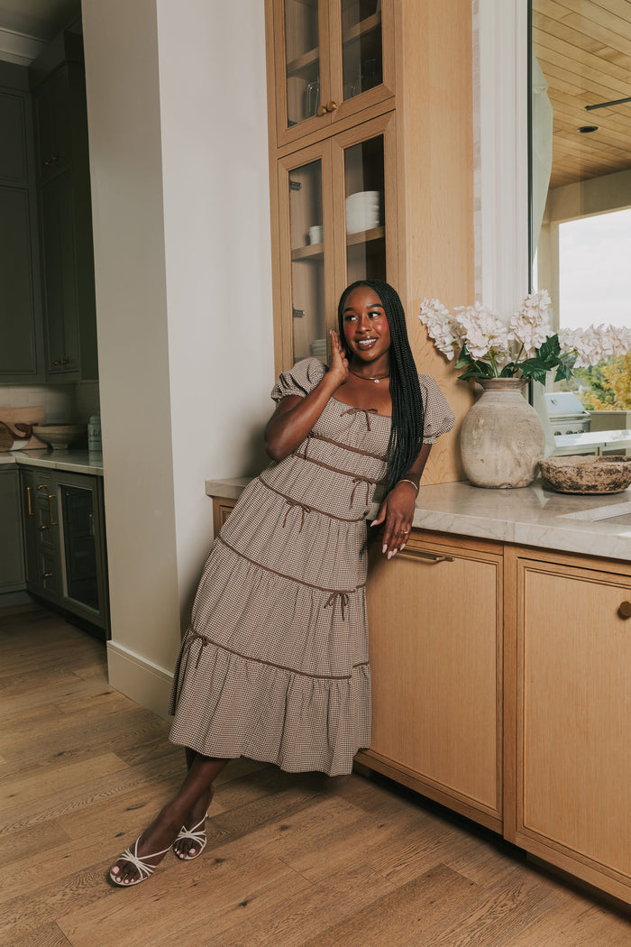 brown and white gingham tiered midi dress lifestyle