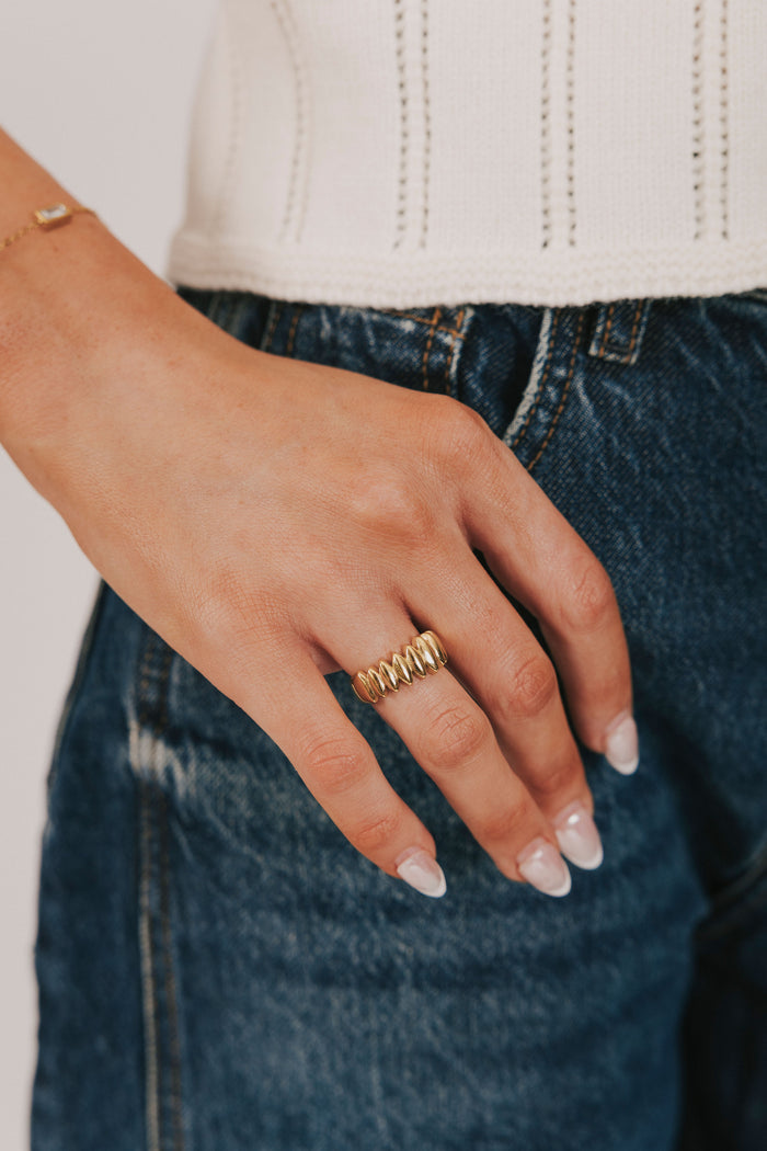 gold ring with diamond design