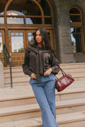 brown knit sweater with front tie detail lifestyle
