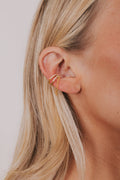 Gold colored 925 sterling silver hoop ear cuff with double hoop design with rhinestones and a dangle chain accent.