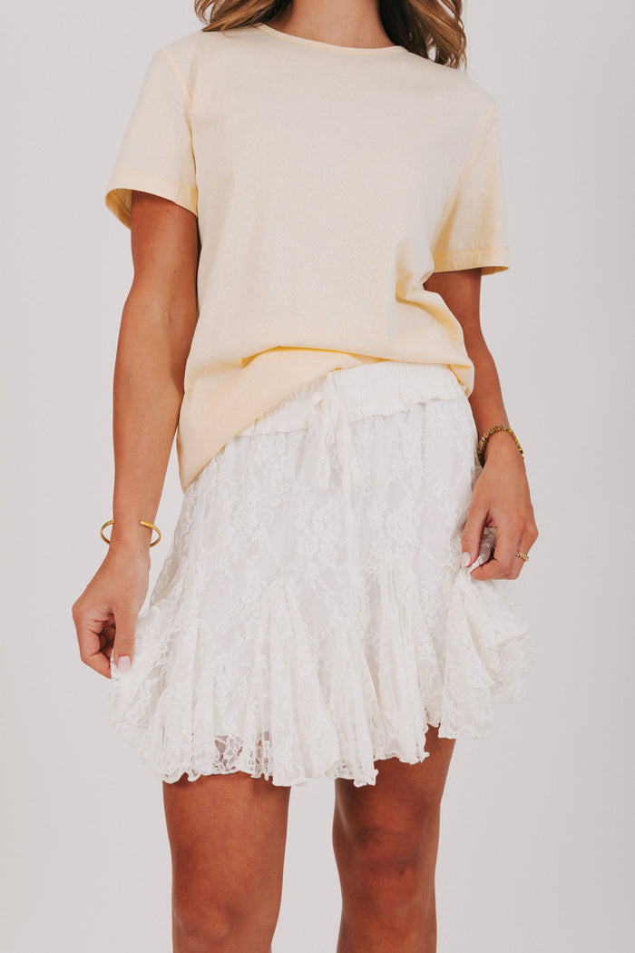 white lace mini skirt with ruffles