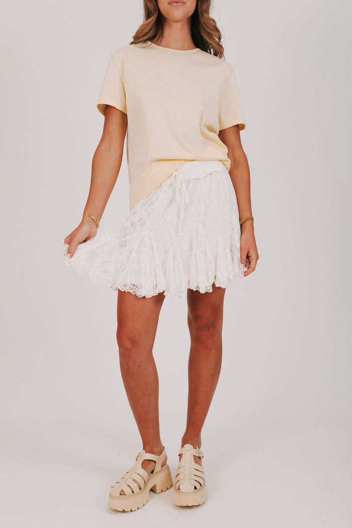 white lace mini skirt with ruffles