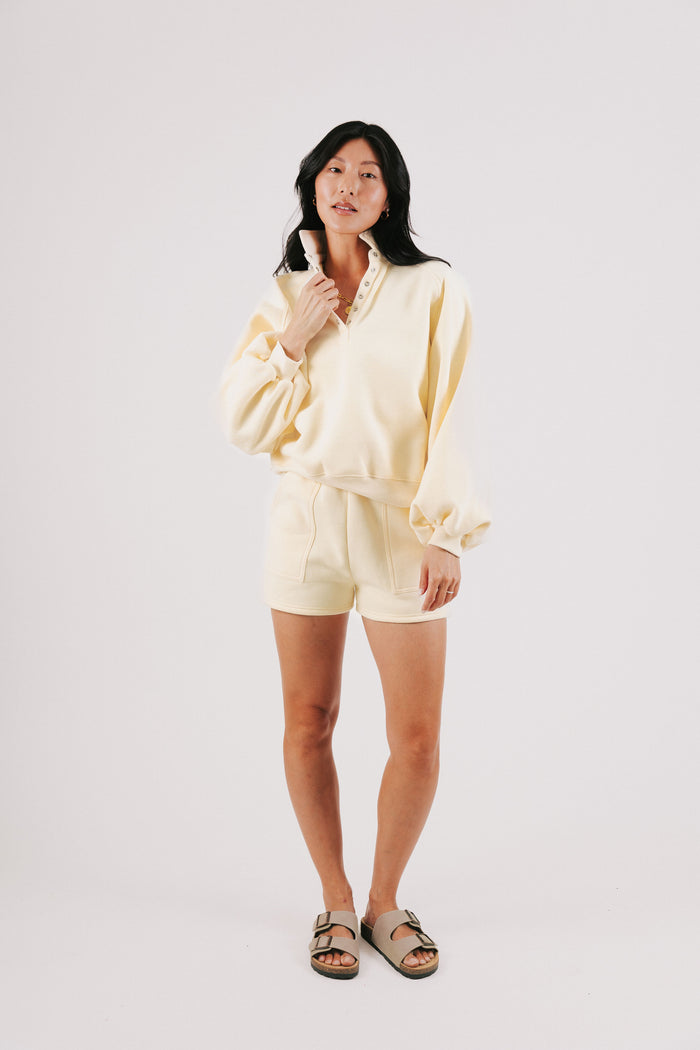 pale yellow partial button down sweatshirt full