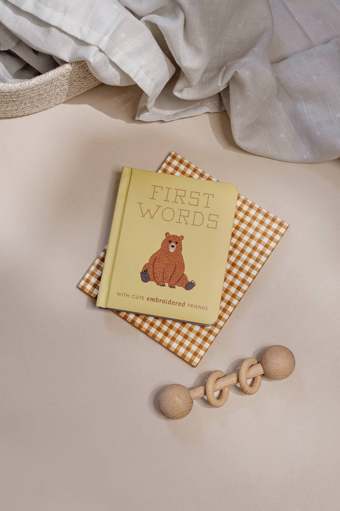 baby book of first words with embroidery styled art