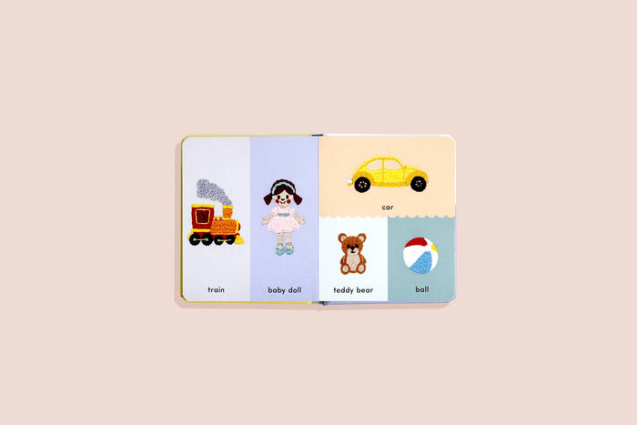 baby book of first words with embroidery styled art