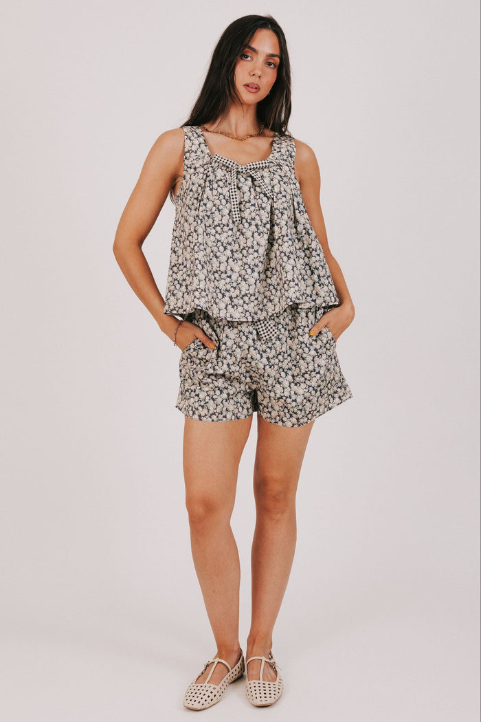 black floral print shorts with bow detail front
