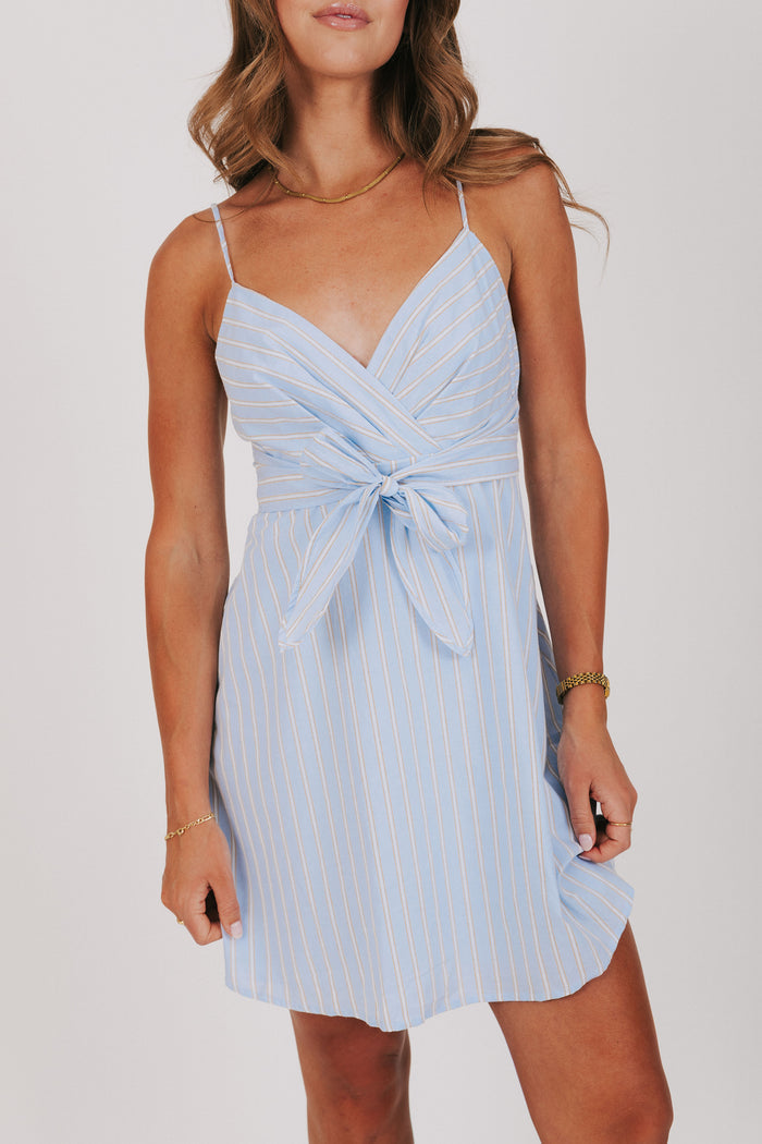 light blue striped dress with bow accent