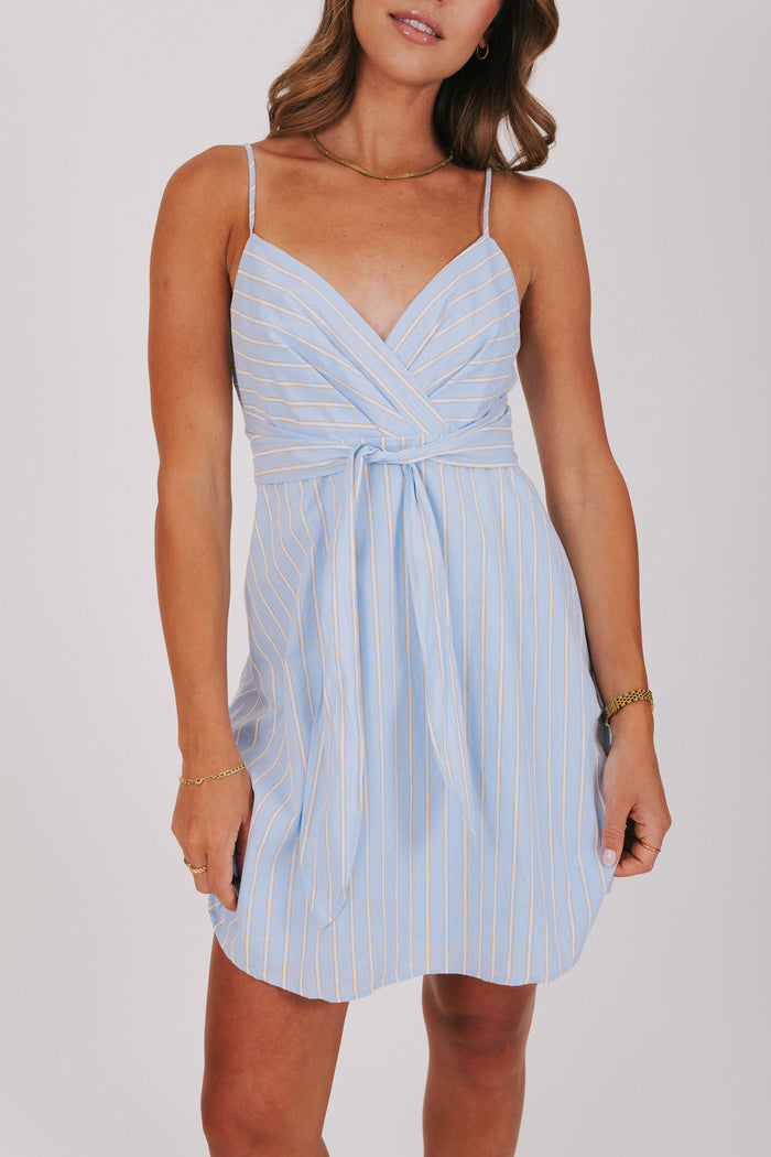 light blue striped dress with bow accent