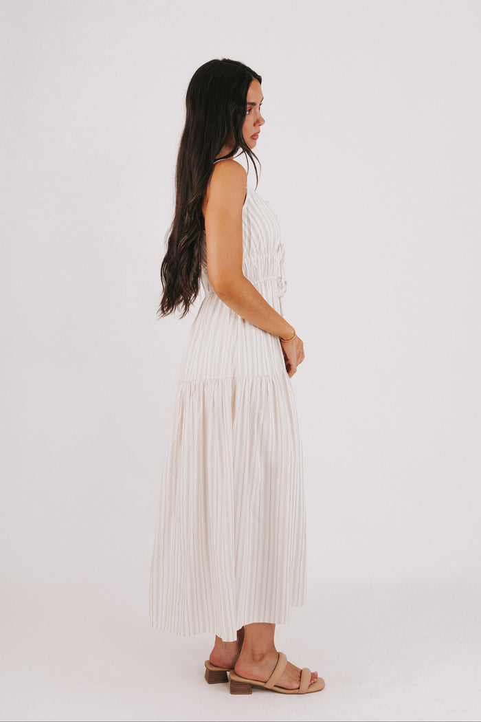 tan striped maxi dress with bow at the waist side
