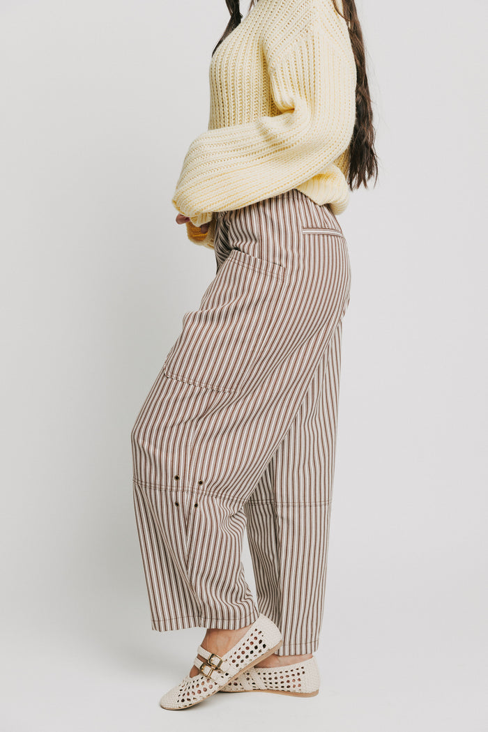 brown and white striped barrel pants side