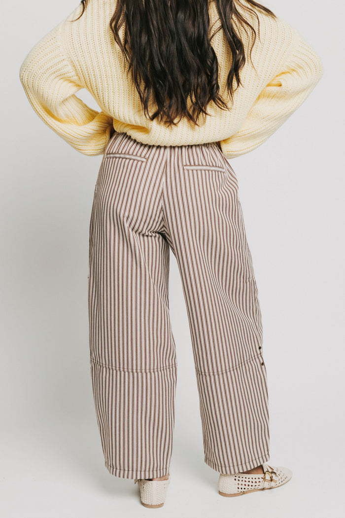 brown and white striped barrel pants back