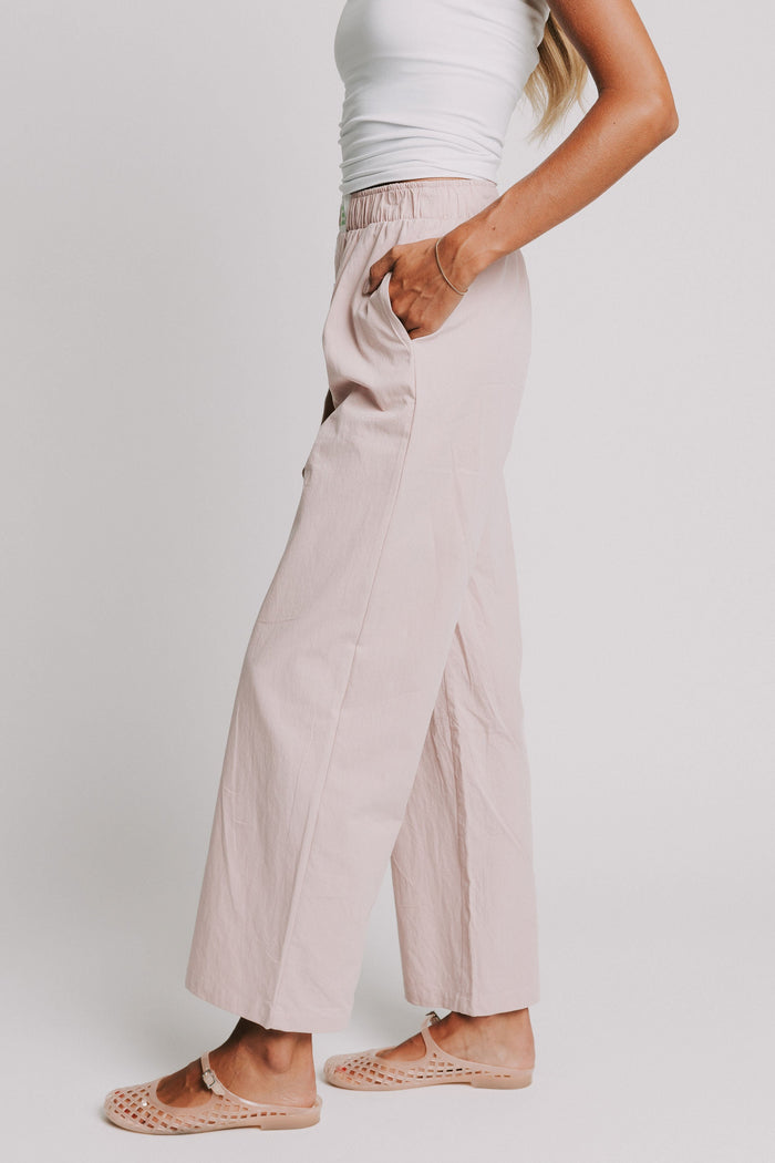 mauve pants with elastic waistband and buttons side