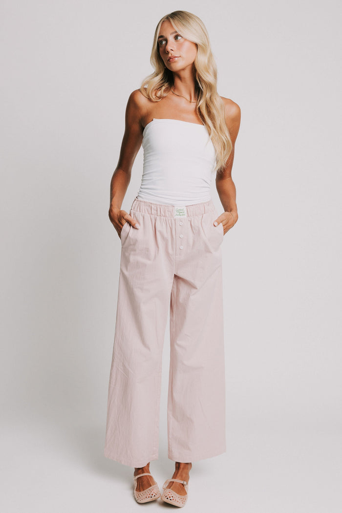mauve pants with elastic waistband and buttons