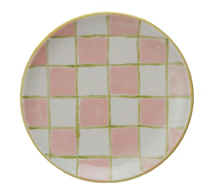 Round ceramic plate with pink and white checkered pattern