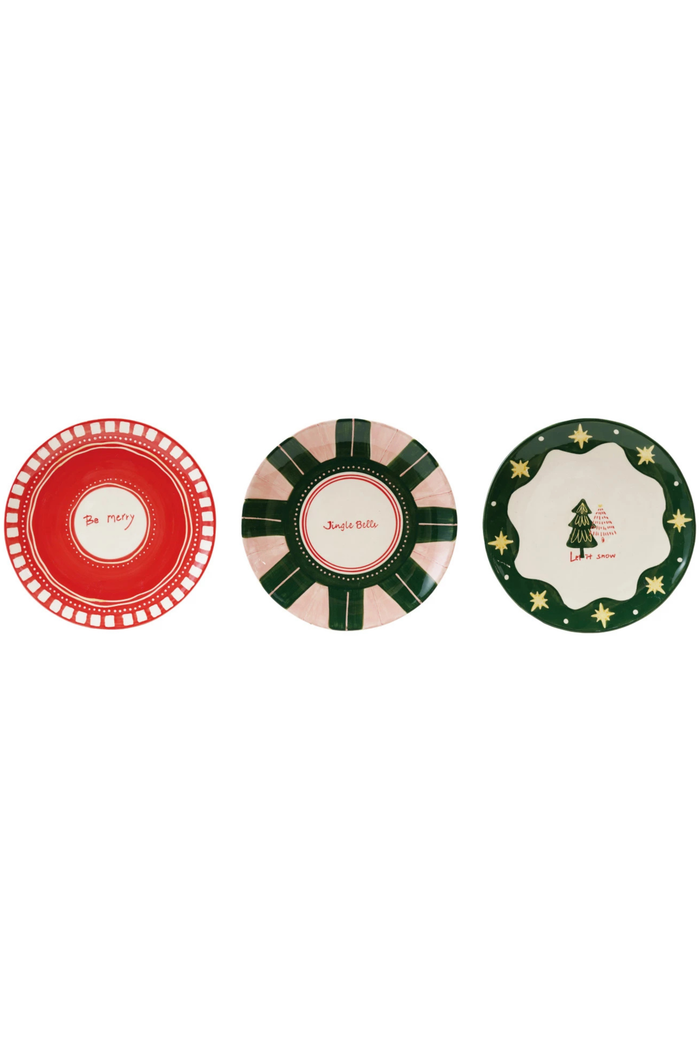 Three decorative plates with festive designs on a white background