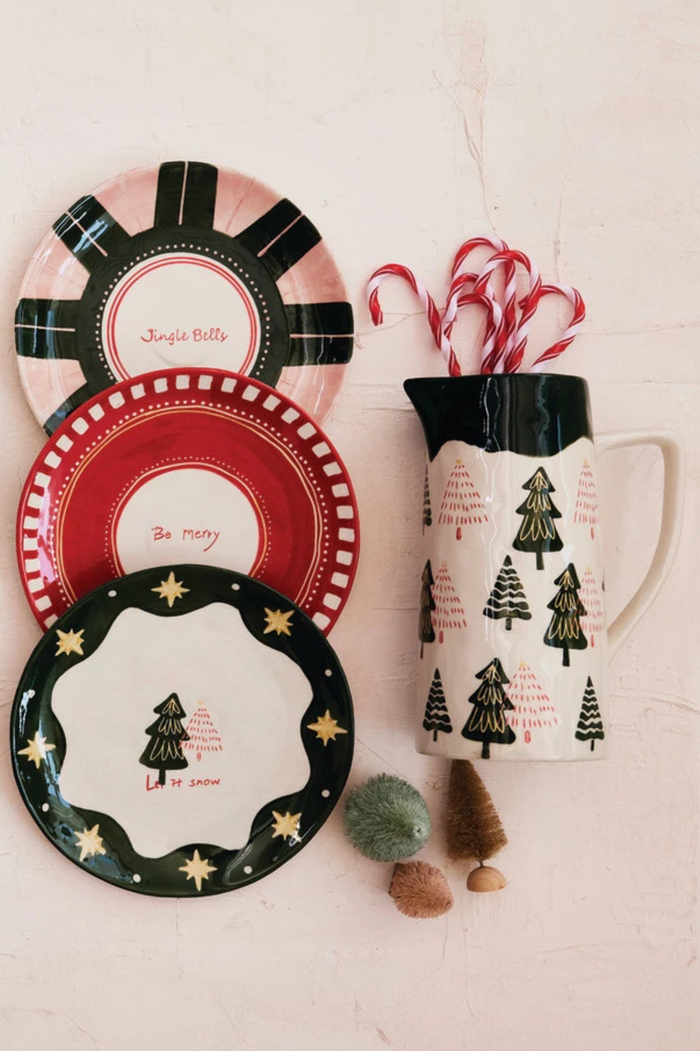 Set of Christmas-themed plates and a pitcher with candy canes