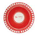 Red plate with white text 'Be Merry' on a white background