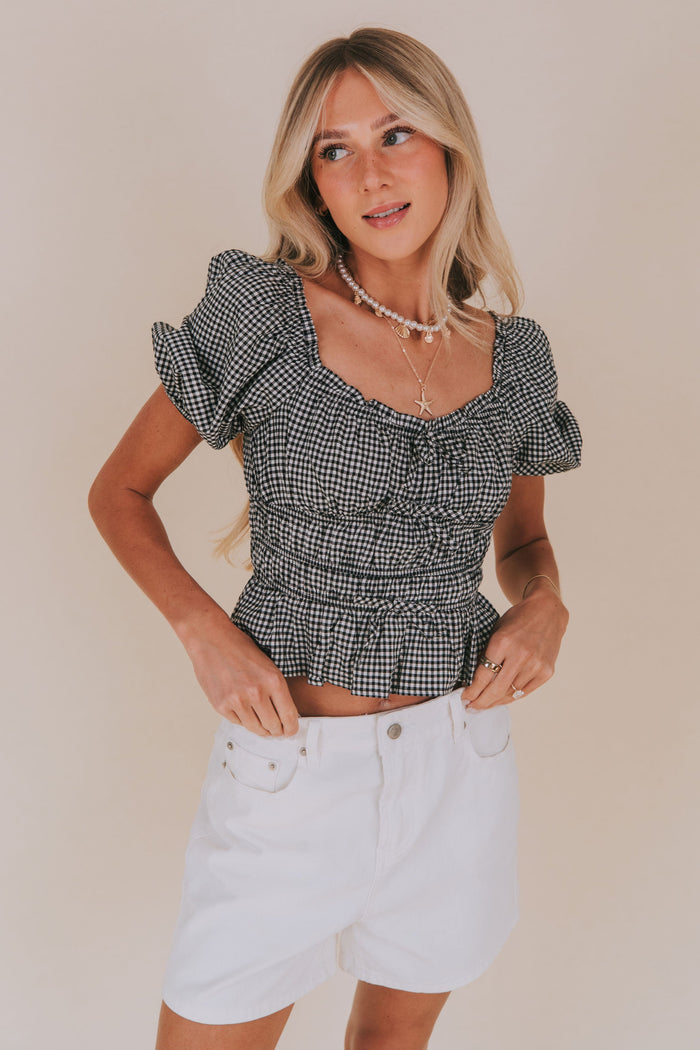 gingham blouse smocked bodice flattering fit bow details puff sleeves square neckline ruffle trim white and black