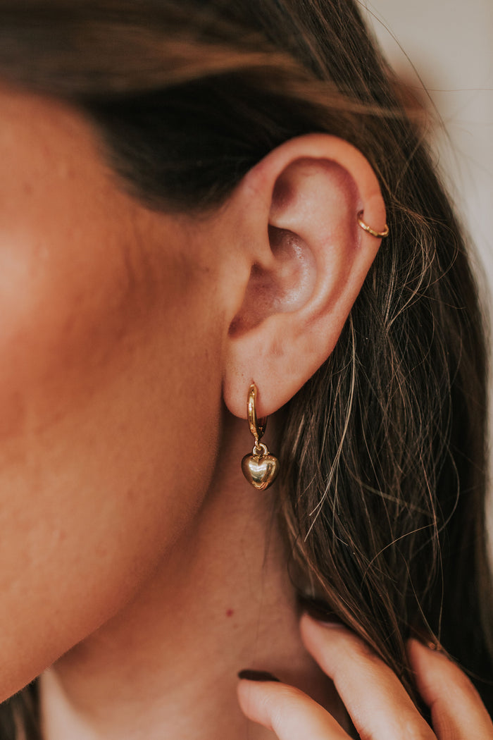 heart shaped dangle earring close up