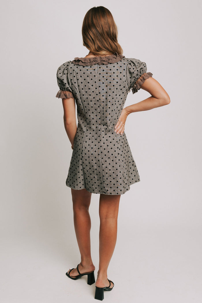 brown and black polka dot mini dress with brown lace trim back