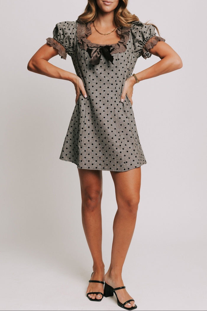 brown and black polka dot mini dress with brown lace trim