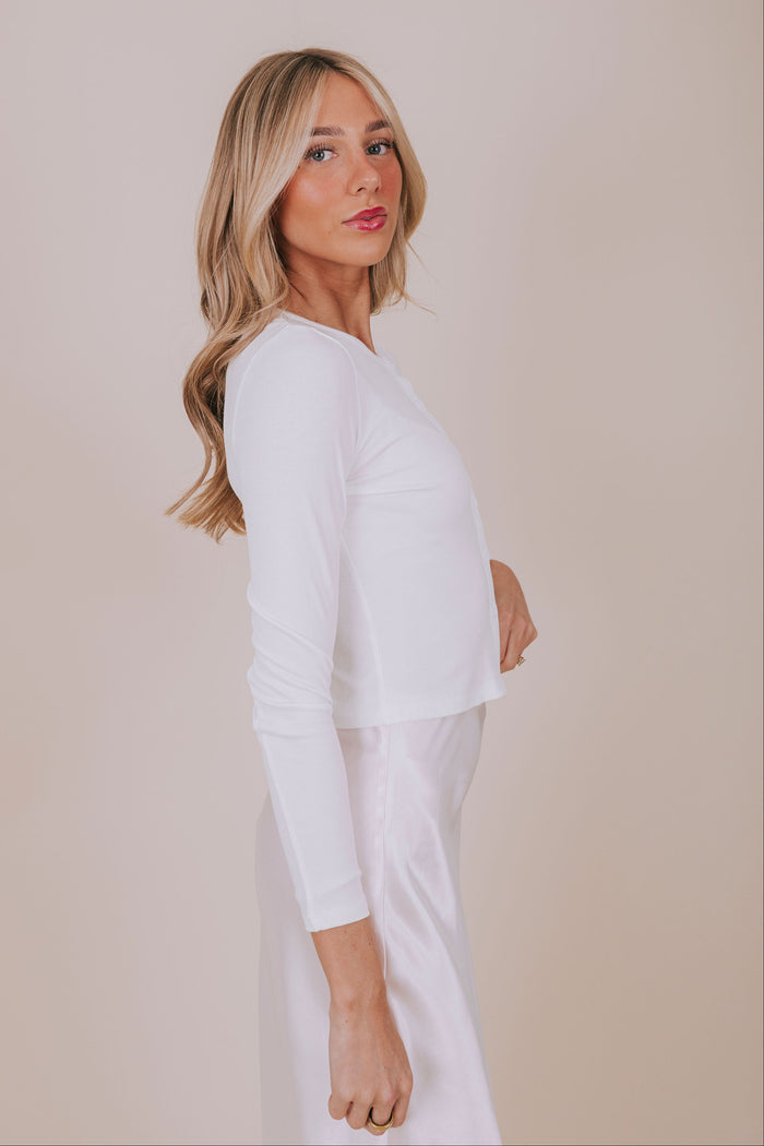 white fitted button down long sleeve side