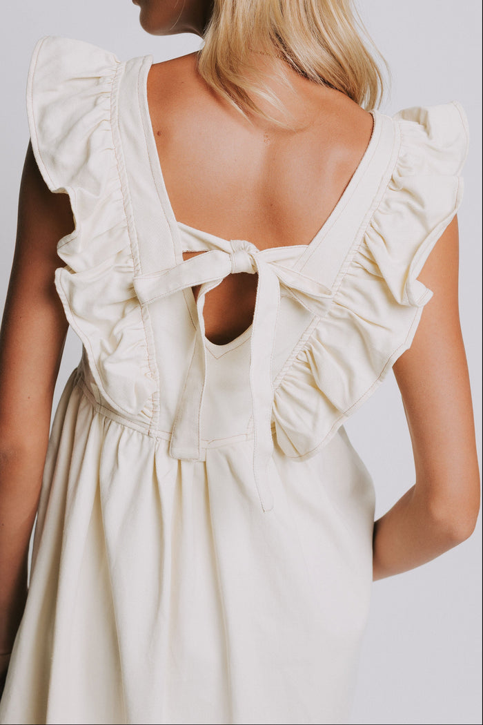 ivory denim midi dress with ruffled sleeves back close