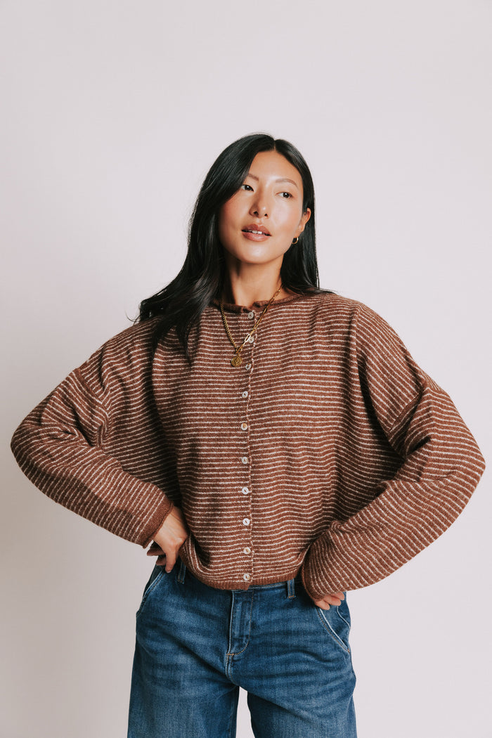 brown and white striped cardigan with rolled edges