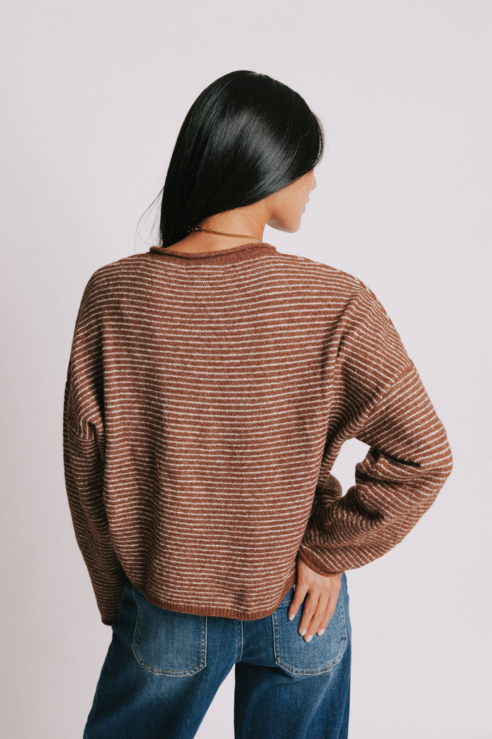 brown and white striped cardigan with rolled edges back