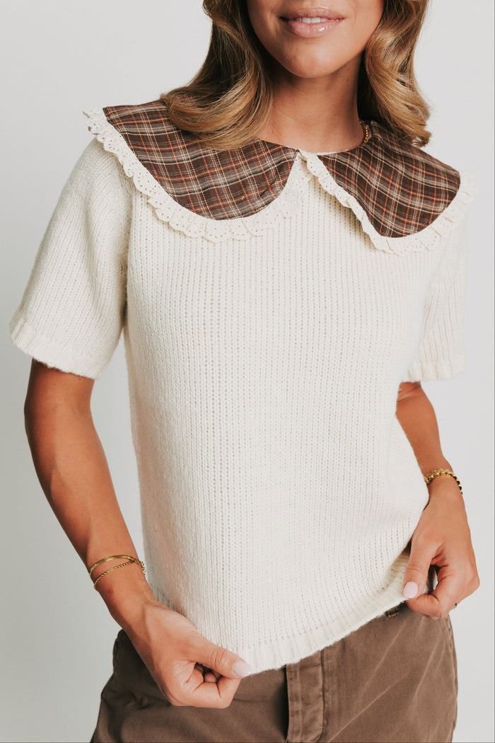 ivory knit short sleeve top with plaid collar front