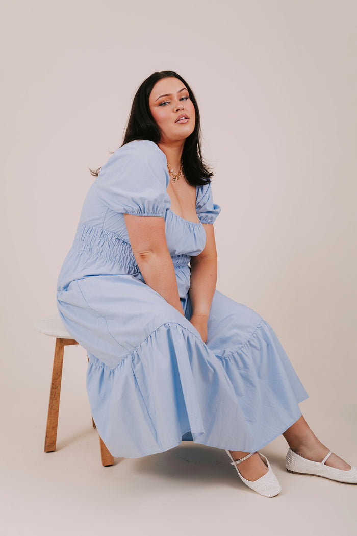 plus size blue smocked tiered midi dress pose